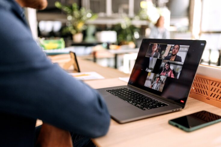 Close up of man having online meeting.