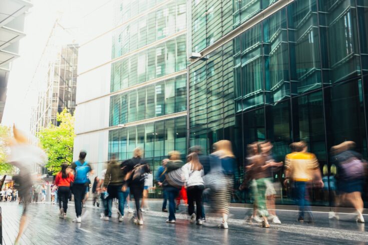 People walking down a street.