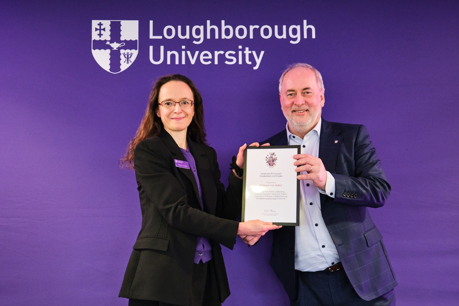 Professor Lise Jaillant receives an Academic Promotion Celebration Certificate, presented by Professor Nick Jennings at Loughborough University
