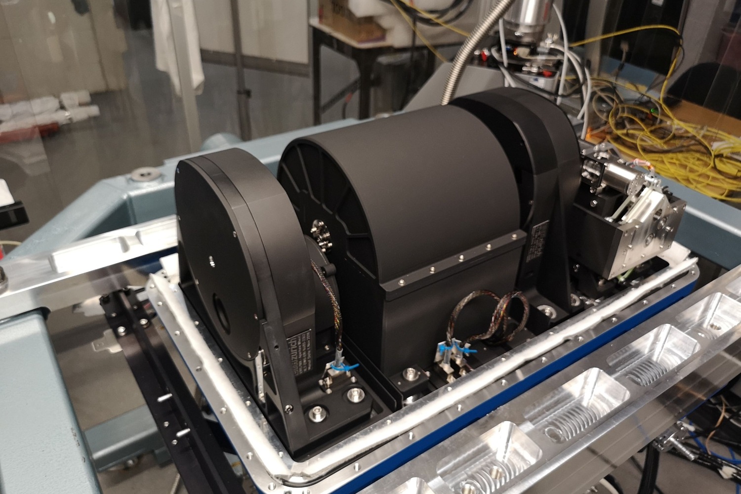 A black cylindrical instrument.